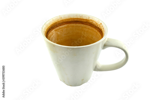 Fényképezés A soiled white ceramic mug with a coffee and tea residue inside, isolated on a white background with a clipping path