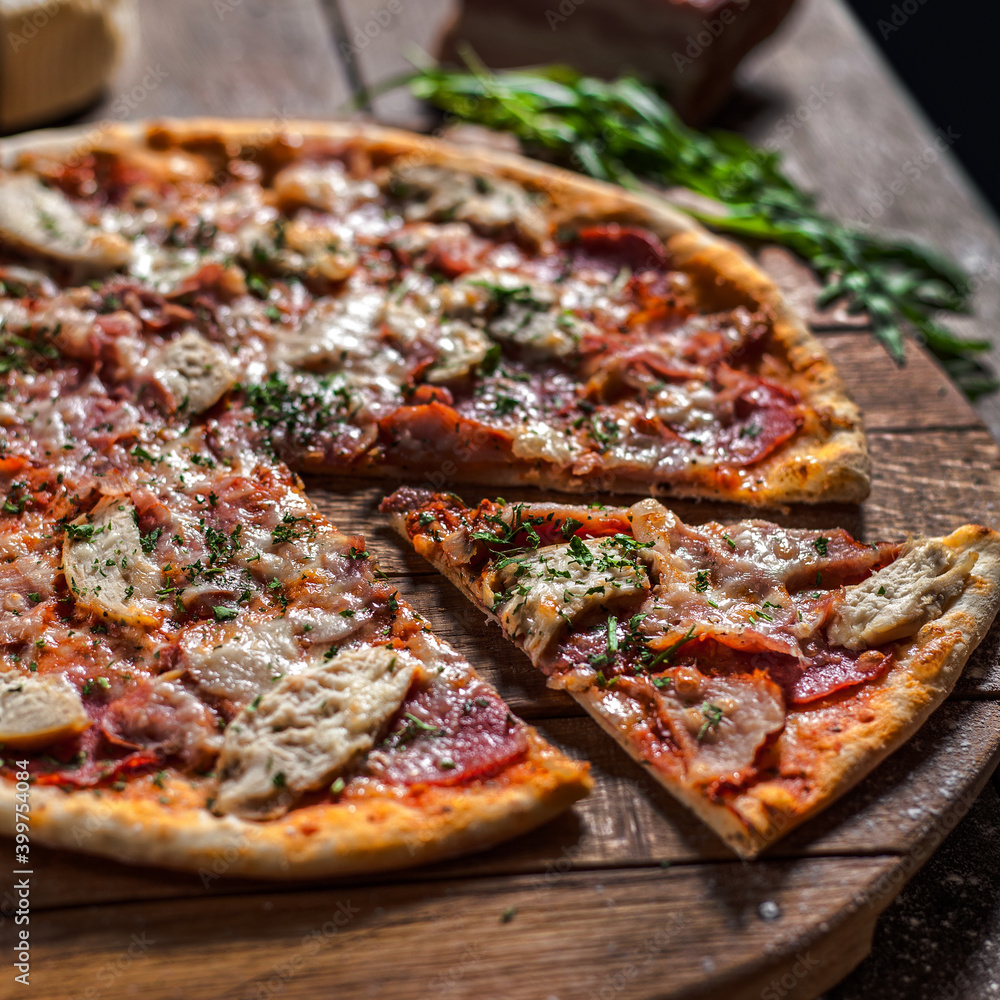 Italian pizza on wooden board