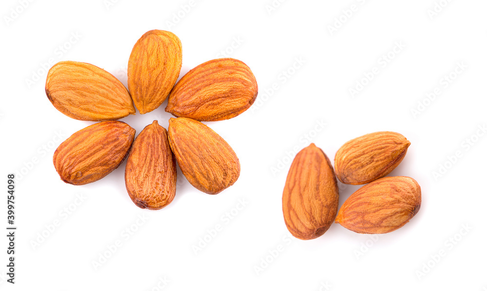 Almonds an isolated on white background, top view Almonds an isolated on white background, top view