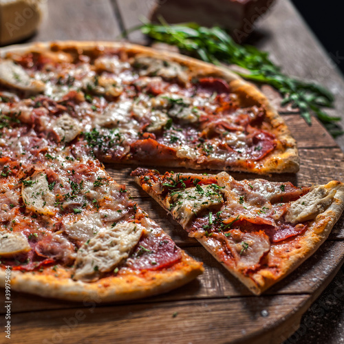 Italian pizza on wooden board