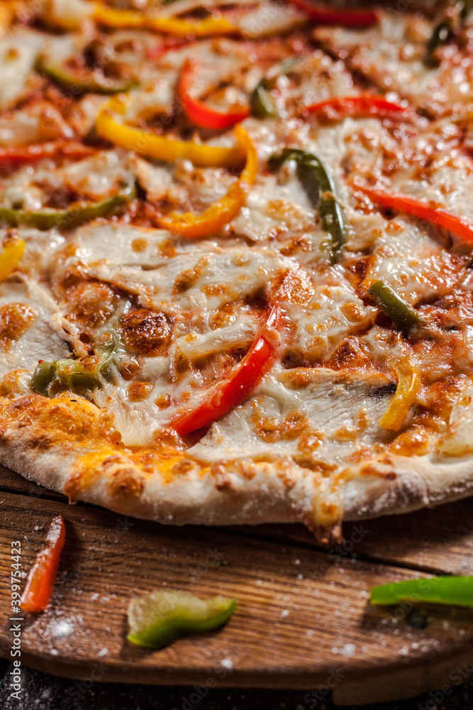 Italian pizza on wooden board Italian pizza on wooden board
