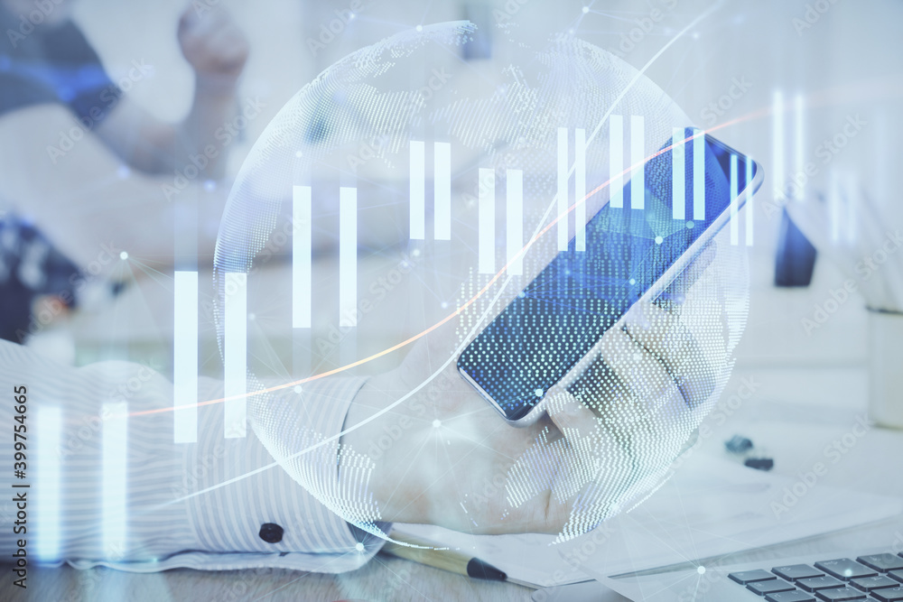 Double exposure of man's hands holding and using a digital device and forex graph drawing. Financial market concept. Double exposure of man's hands holding and using a digital device and forex graph drawing. Financial market concept.