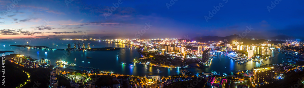 Aerial photography of the night view of the urban architectural landscape of Sanya, China