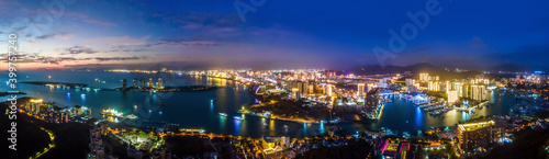 Aerial photography of the night view of the urban architectural landscape of Sanya  China