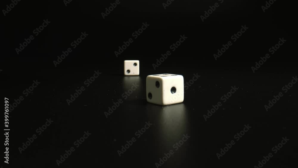 Concept of board games for children and adults. dices falling on black surface. High quality. Concept of board games for children and adults. dices falling on black surface. High quality.