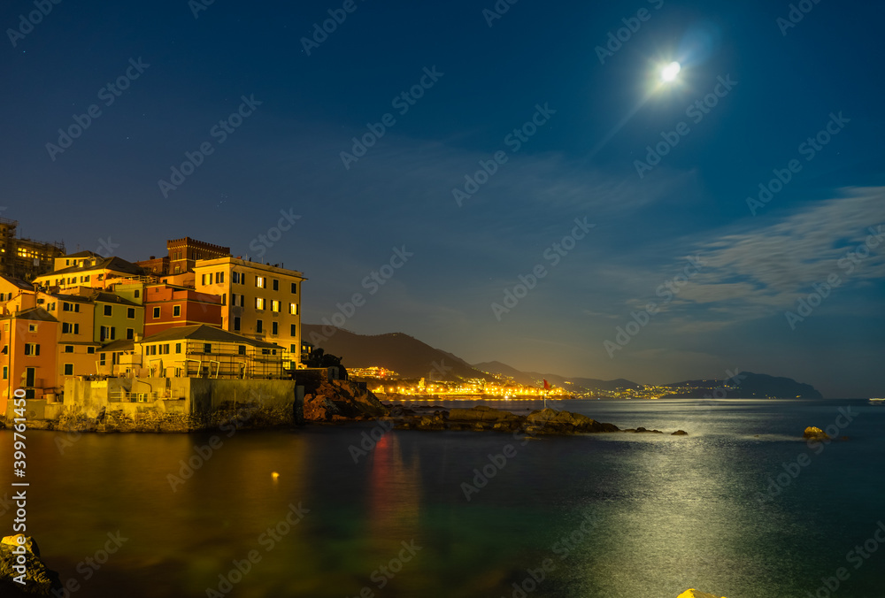 Moonlight view of the ancient fishing village in Genoa, Ligurian sea, Italy.