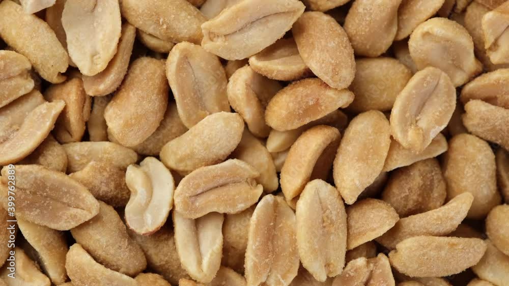 salted roasted peanuts top view. snack to beer salted roasted peanuts top view. snack to beer