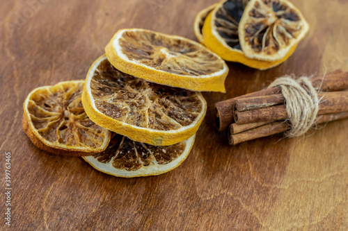 christmas set dried flavorful orange slices and cinnamon on a wooden table