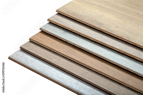 Laminate background. Samples of laminate or parquet with a pattern and wood texture for flooring and interior design. Production of wooden floors