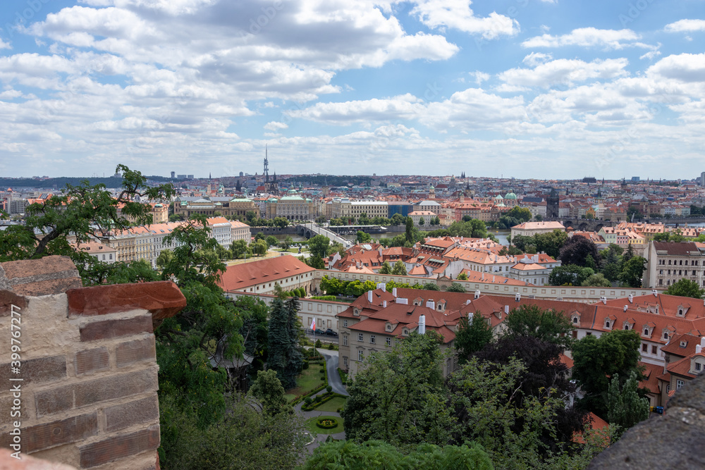 Prague city panorama. Orange and red roofs of the old city.