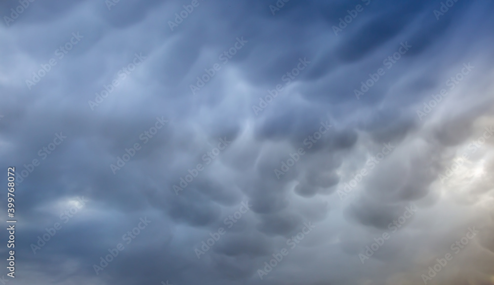 Dark cloudy sky before thunderstorm - Ominous Rain Clouds Dark cloudy sky before thunderstorm - Ominous Rain Clouds