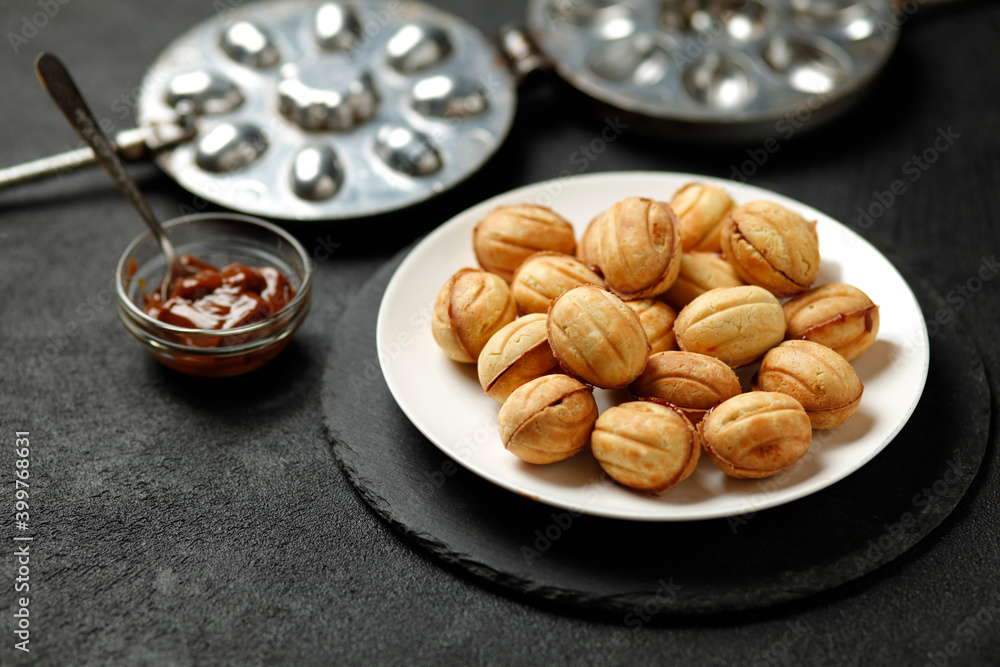 National sweets of russia - nuts with condensed milk. Homemade New Year's baked goods. National sweets of russia - nuts with condensed milk. Homemade New Year's baked goods.