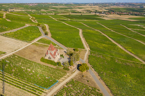 Bird's eye view of the Kreuzkapelle in Gau Bickelheim / Germany in the middle of vineyards photo