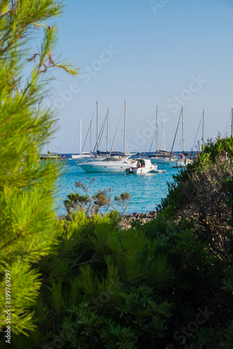 Menorca, Spain - August 3, 2020: Nice bay with sailboats and yachts, Cala Son Saura, Menorca, Balearic Islands. Spain.
