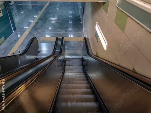 Turkey, Ankara - October 24, 2019: Escalator at ASKİ metro station in Ankara. A moving staircase leading down to the underground station