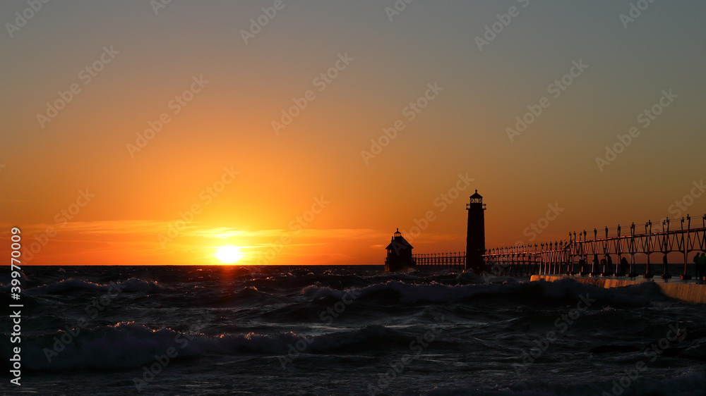 Grand Haven South Pier Lighthouse at sunset