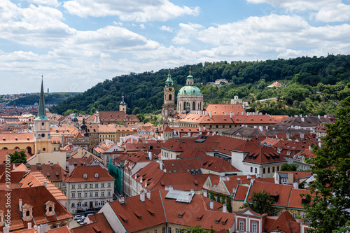Prague city panorama. Orange and red roofs of the old city.