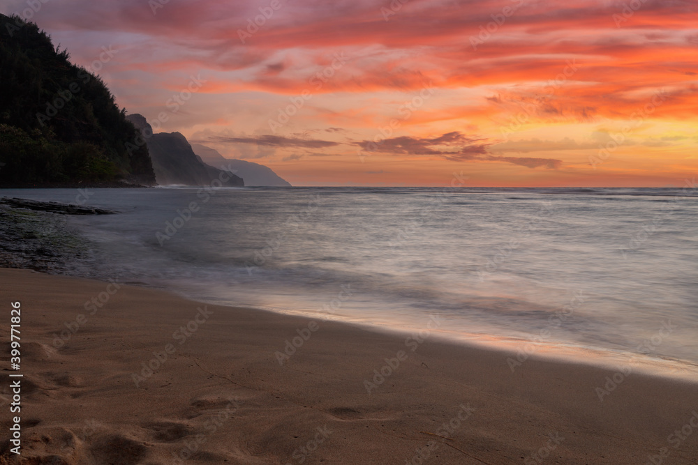 sunset in hawaiian beach with red sky