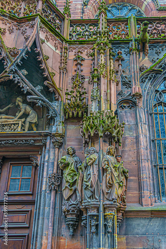 Architectural fragments of famous Roman Catholic Strasbourg Cathedral (Cathedral of Our Lady of Strasbourg or Cathedrale Notre-Dame de Strasbourg, 1015 - 1439). Strasbourg, Alsace, France.