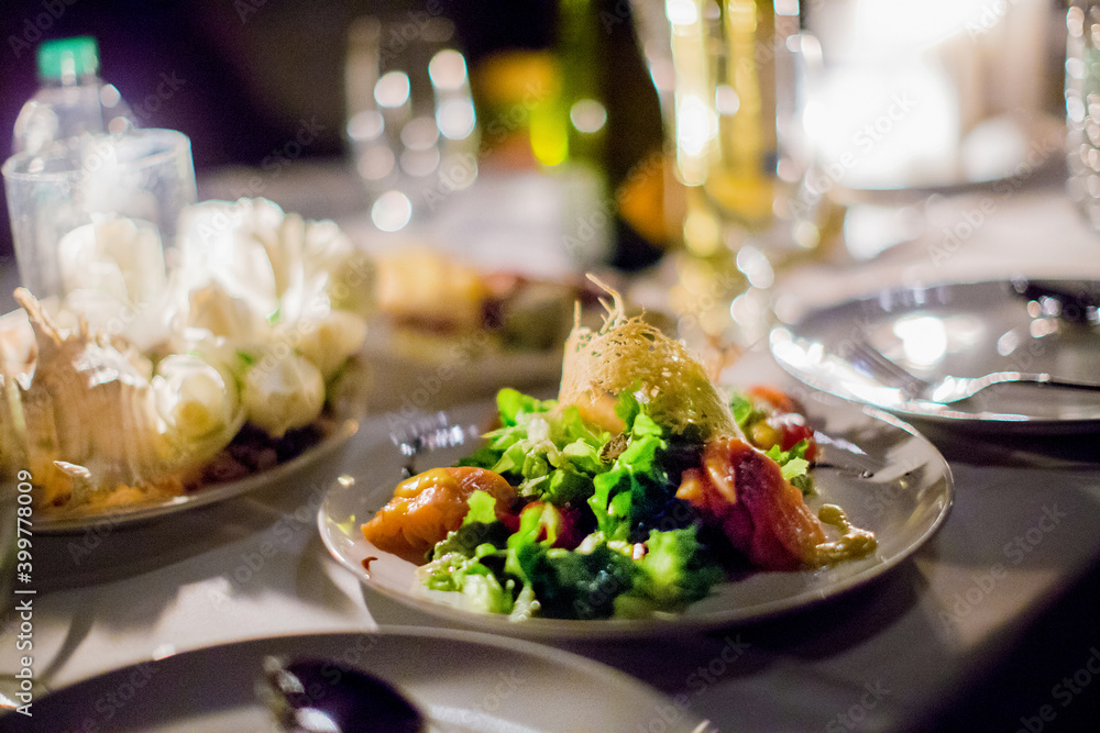 A gourmet dish on the table in a Michelin restaurant A gourmet dish on the table in a Michelin restaurant