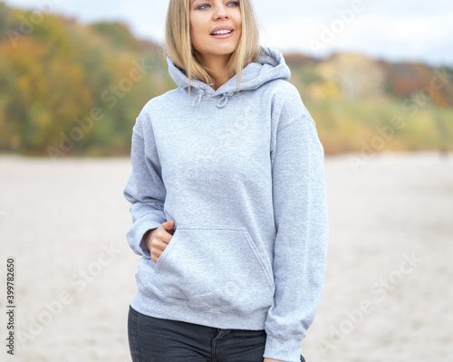 Wallpaper Mural Woman wear hoodie on the beach Torontodigital.ca