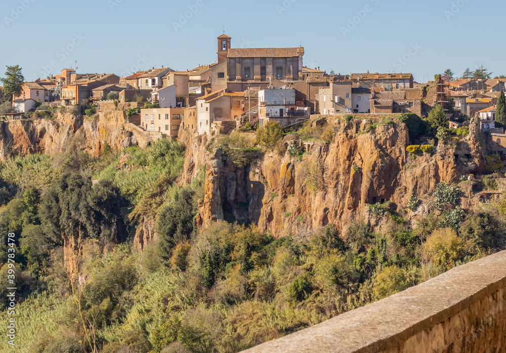 Obraz premium Castel Sant'Elia - located on a scary cliff and famous for its wonderful basilica, Castel Sant'Elia is among the most notable villages in central Italy. Here a glimpse of the houses over the cliff