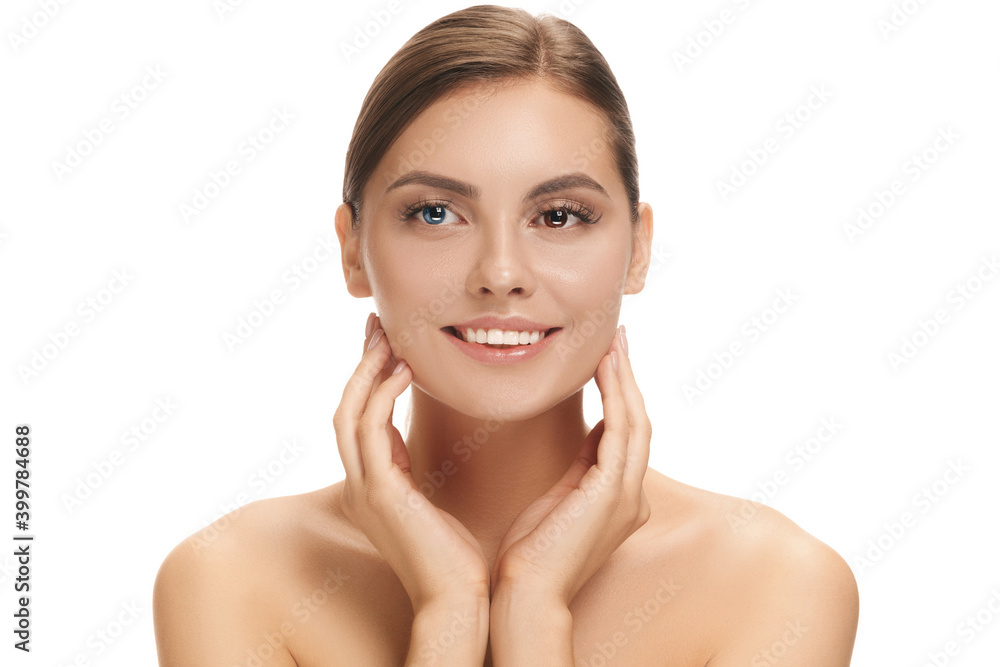 Beautiful caucasian woman with heterochromia isolated on white studio background. Copyspace for ad. Concept of beauty, fashion, healthcare, skincare. Complete special eyes colour, blue and brown. Beautiful caucasian woman with heterochromia isolated on white studio background. Copyspace for ad. Concept of beauty, fashion, healthcare, skincare. Complete special eyes colour, blue and brown.