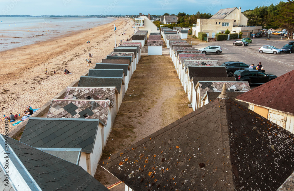 beach huts and roofs in two rows