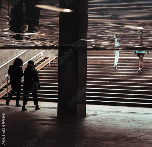 person walking on the pier