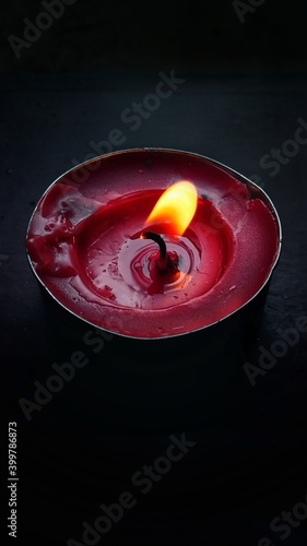 A red burning candle 