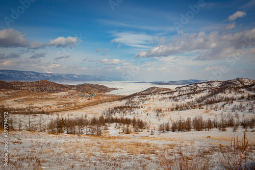 Sunny winter field landscape.  Prairie in winter. Nature of Siberia