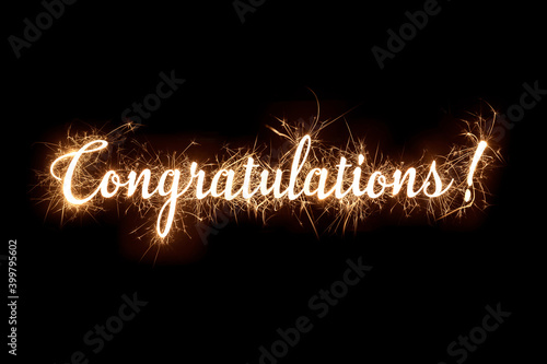 Congratulations in dazzling sparkler effect on dark background