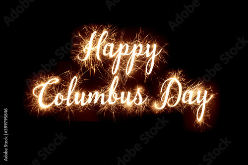 Happy Columbus Day in dazzling sparkler effect on dark background