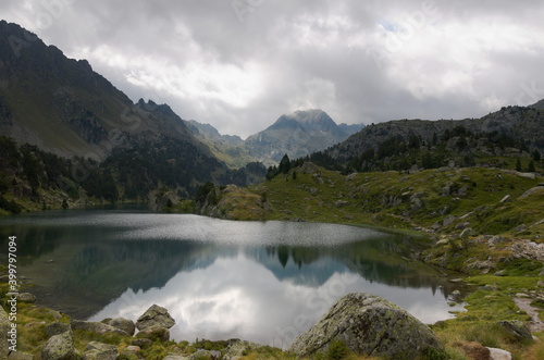 Mountain lake and bad weather in the alps