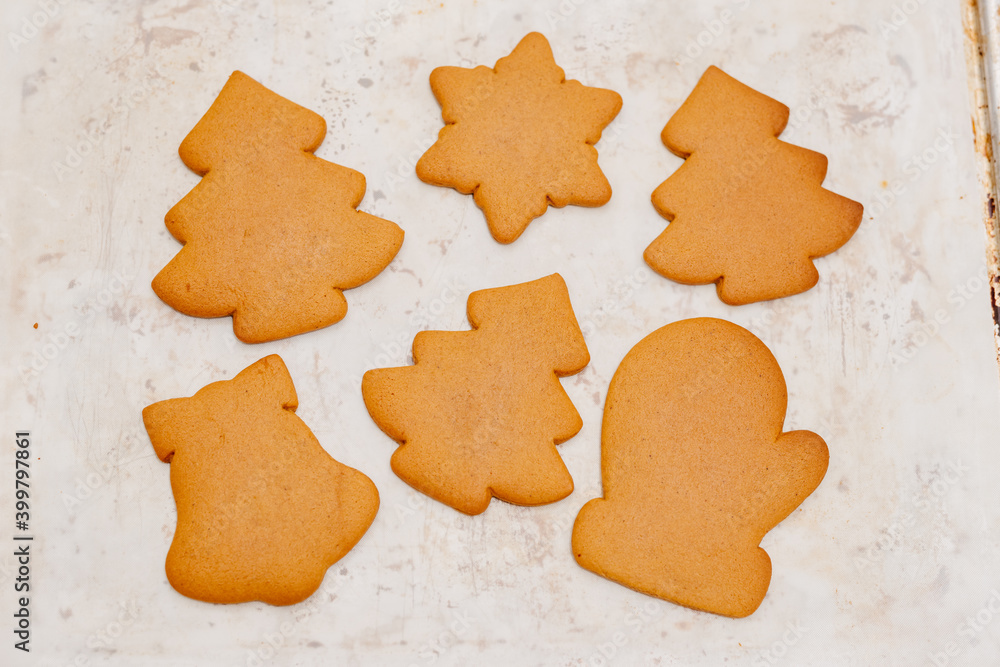 Gingerbread. The process of making homemade Christmas gingerbread. The woman bakes and decorates Christmas gingerbread. Gingerbread. The process of making homemade Christmas gingerbread. The woman bakes and decorates Christmas gingerbread.