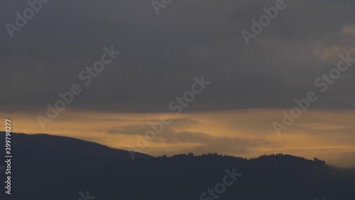 Moody dark cloud descending over entoto mountains in ethiopia, this shot is good for feature film during dark hours or start night. photo