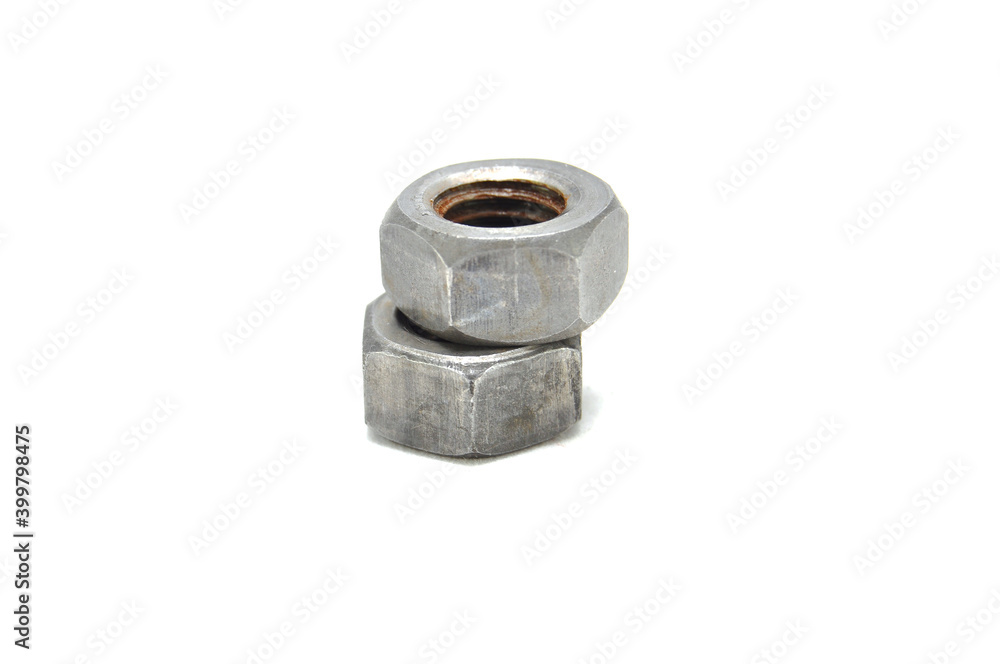 Rusty nuts on white background close-up. engineering, industry, technology Rusty nuts on white background close-up. engineering, industry, technology
