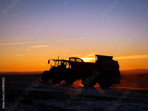 tractor at sunset