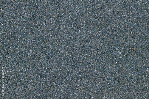 Texture of bituminous coating for the facade of the house. Seamless texture. Bituminous coating with stone texture. Can be used in interior design, in architectural design and construction.