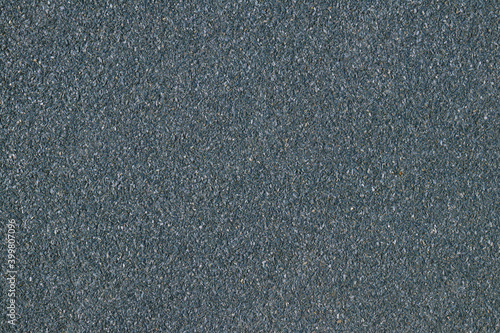 Texture of bituminous coating for the facade of the house. Seamless texture. Bituminous coating with stone texture. Can be used in interior design, in architectural design and construction.