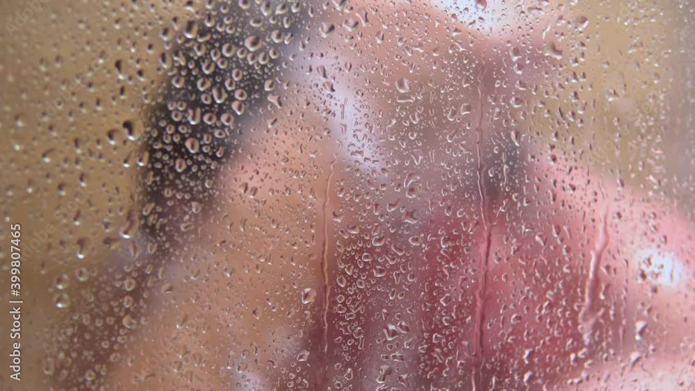 Man in the bathroom washes his hair with shampoo Man in the bathroom washes his hair with shampoo