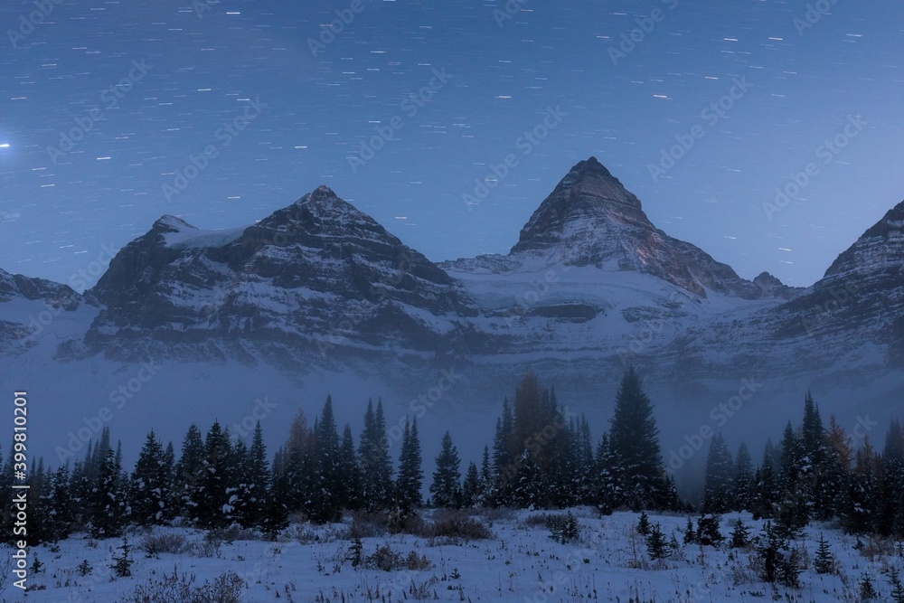 Night sky at Mount Assiniboine in winter from Nub peak. The Landscape of Mount Assiniboine, the Queen of Canadian Rockies, British Columbia, Canada. Beautiful mountains near Banff National park.