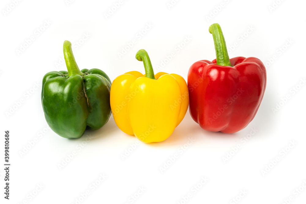 three bell peppers isolated on white background. Fresh vegetables Three sweet Red, Yellow, Green Peppers. vegan food concept. healthy eating three bell peppers isolated on white background. Fresh vegetables Three sweet Red, Yellow, Green Peppers. vegan food concept. healthy eating