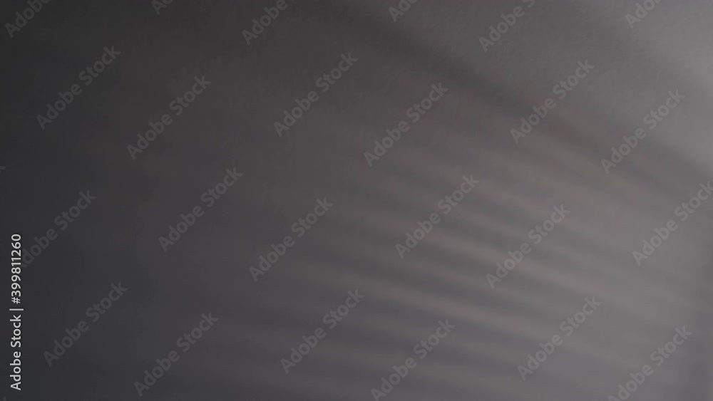 Blurry dark shadows moving on the wall. Spooky shadow art noise texture. closeup the motion of shadow batten of lath light on white wall texture background. Slow motion video. stock footage Blurry dark shadows moving on the wall. Spooky shadow art noise texture. closeup the motion of shadow batten of lath light on white wall texture background. Slow motion video. stock footage
