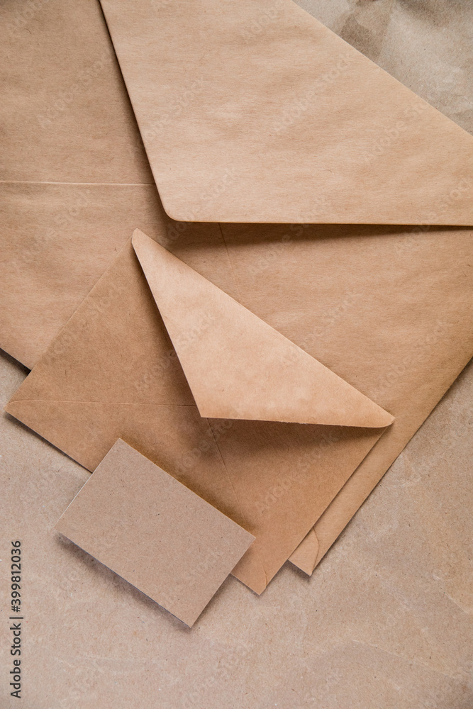 brown envelope on wooden background brown envelope on wooden background