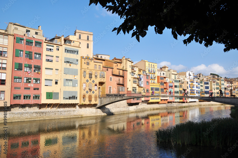 Panoramic view of small colorful houses and a bridge. Channel with an arched bridge.