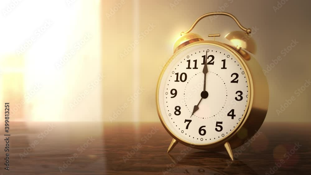 Alarm clock ringing in bright room lit by a sunny morning sun. It's time to wake up. Suitable for new beginning, job occupation or education concepts. Alarm clock ringing in bright room lit by a sunny morning sun. It's time to wake up. Suitable for new beginning, job occupation or education concepts.