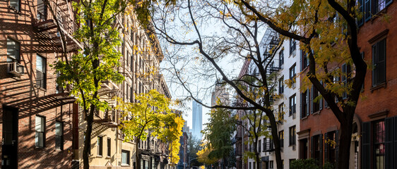 Panoramic view of colorful fall scene on Sullivan Street in the SoHo neighborhood of New York City