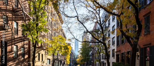 Panoramic view of colorful fall scene on Sullivan Street in the SoHo neighborhood of New York City