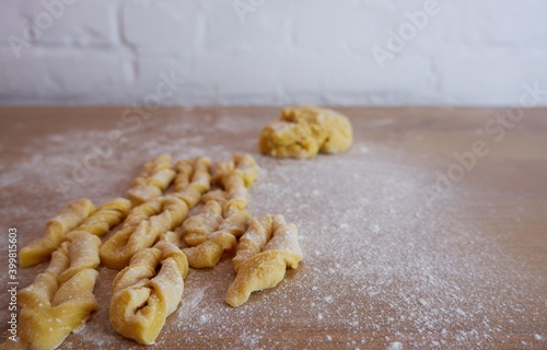 Making homemade cakes. Raw dough for brushwood. Homemade food during quarantine.